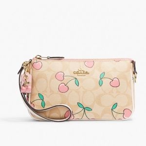 Coach Nolita 19 In Signature Canvas With Heart Cherry Print